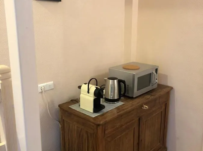 Holiday home La Au Bout Du Jardin / Sword